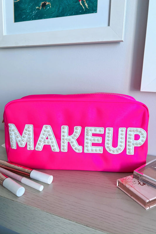 MAKEUP POUCH IN NEON PINK