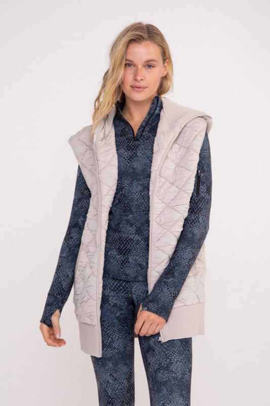 OVERSIZED QUILTED HOODED VEST IN TAUPE